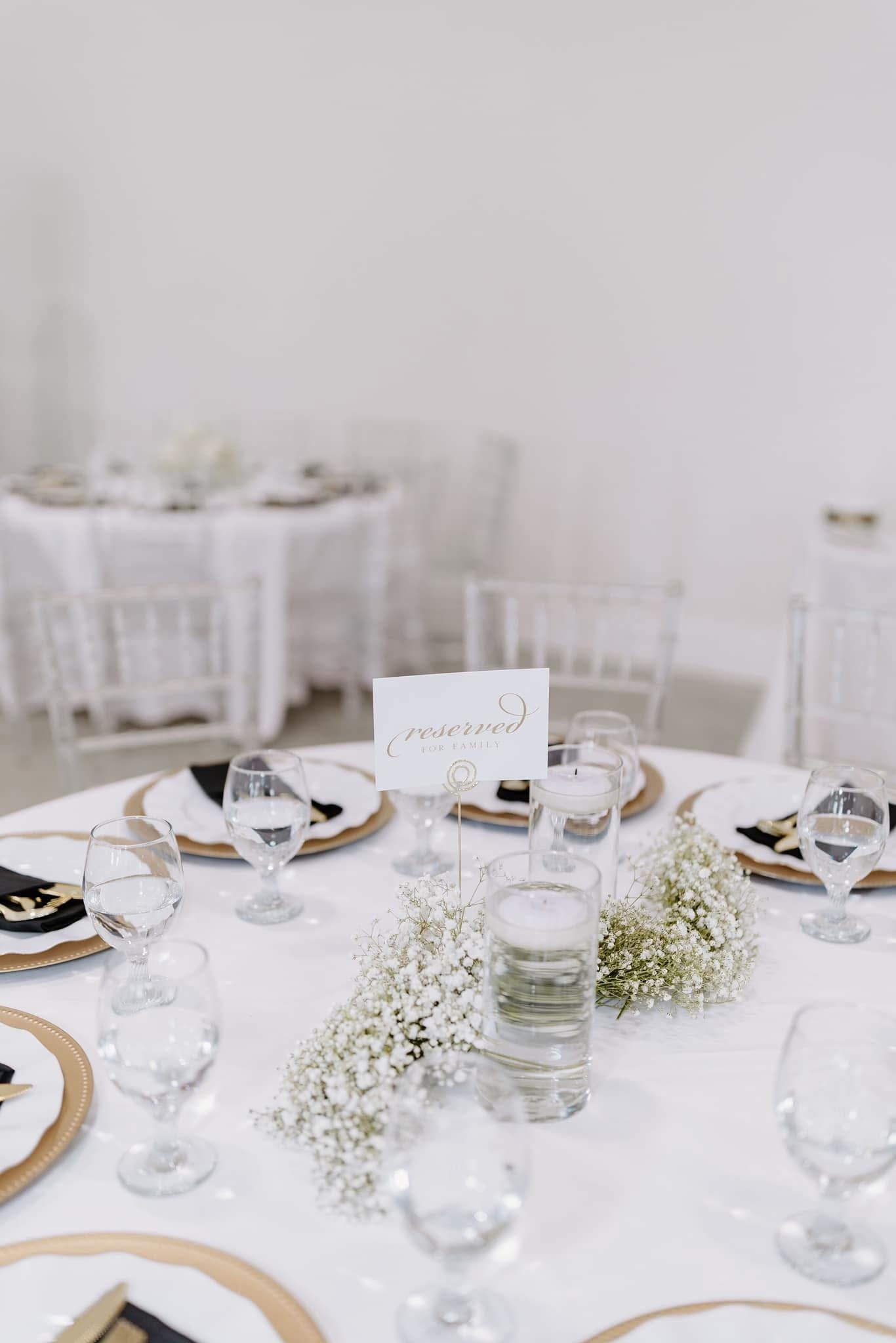 white and gold wedding reception tablescape